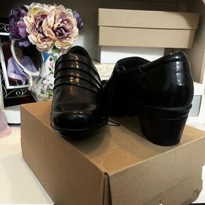 Clarks Black Ankle Boots with Closed Toe Design and Wedge Heel